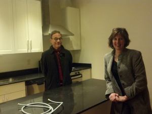 John and Stephanie standing in our new kitchen.